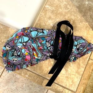 Surgical cap with pony tail ties